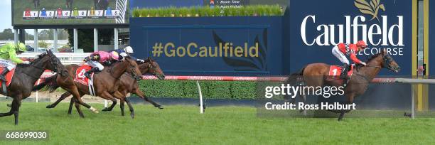 Boom Time ridden by Beau Mertens wins the Robert Taranto Handicap at Caulfield Racecourse on April 15, 2017 in Caulfield, Australia.