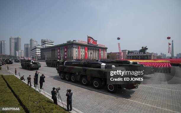 An unidentified missile and mobile launcher makes its way through Kim Il-Sung square during a military parade marking the 105th anniversary of the...