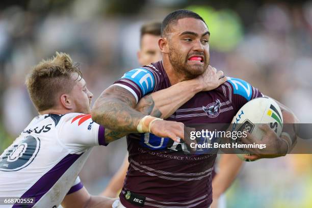 Dylan Walker of Manly is tackled during the round seven NRL match between the Manly Sea Eagles and the Melbourne Storm at Lottoland on April 15, 2017...