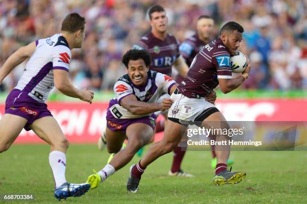 Apisai Koroisau of Manly makes a break during the round seven NRL match between the Manly Sea Eagles and the Melbourne Storm at Lottoland on April...