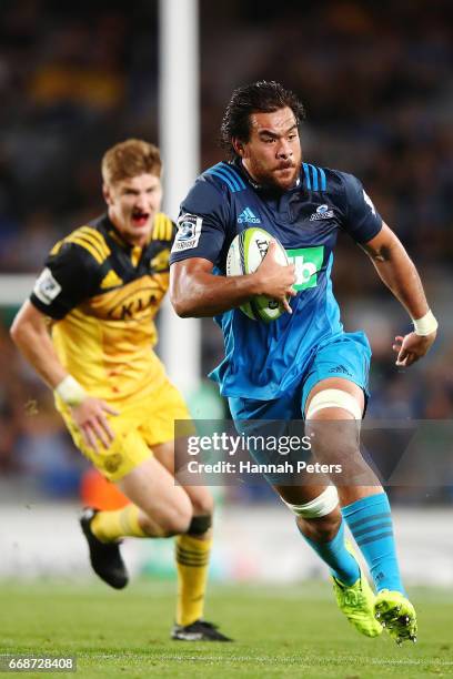 Steven Luatua of the Blues makes a break during the round eight Super Rugby match between the Blues and the Hurricanes at Eden Park on April 15, 2017...