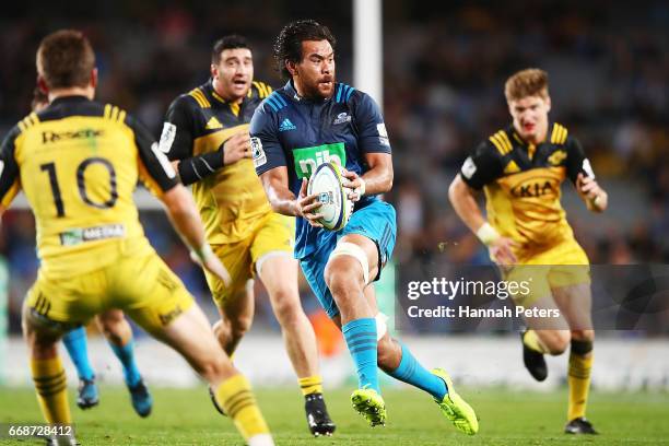 Steven Luatua of the Blues makes a break during the round eight Super Rugby match between the Blues and the Hurricanes at Eden Park on April 15, 2017...