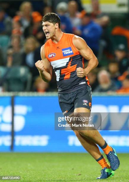 Jonathan Patton of the Giants celebrates kicking a goal during the round four AFL match between the Greater Western Sydney Giants and the Port...