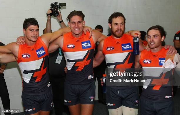 Giants players celebrate winning the round four AFL match between the Greater Western Sydney Giants and the Port Adelaide Power at UNSW Canberra Oval...