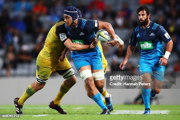 Gerard Cowley-Tuioti of the Blues charges forward during the round eight Super Rugby match between the Blues and the Hurricanes at Eden Park on April...