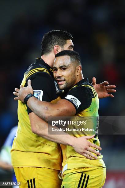 Ngani Laumape of the Hurricanes celebrates with Jeffery To'omaga-Allen of the Hurricanes after winning the round eight Super Rugby match between the...