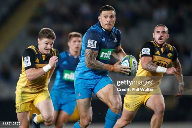 Sonny Bill Williams of the Blues makes a break during the round eight Super Rugby match between the Blues and the Hurricanes at Eden Park on April...