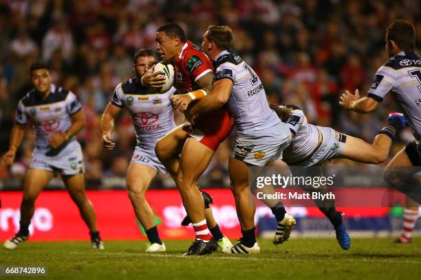 Tyson Frizell of the Dragons is tackled during the round seven NRL match between the St George Illawarra Dragons and the North Queensland Cowboys at...