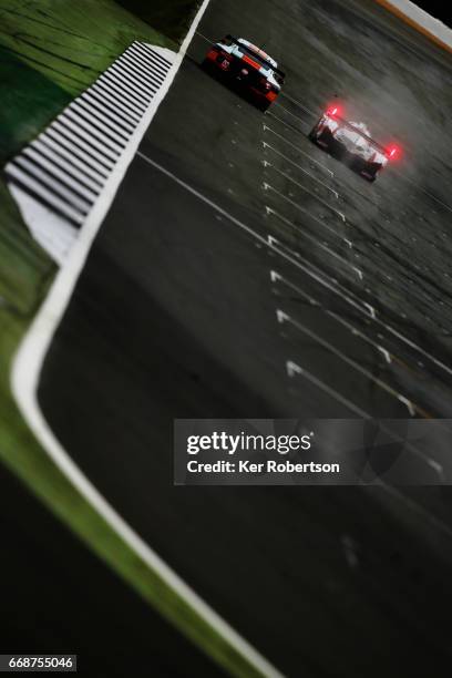 The Gulf Racing Porsche of Michael Wainwright, Ben Barker and Nicholas Foster and the Toyota Gazoo Racing TS050 Hybrid of Mike Conway, Kamui...