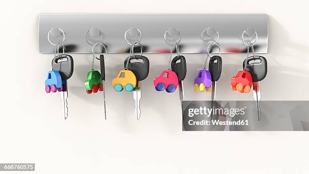 car keys with different key ring hanging on key hook, electro car - key ring stock illustrations