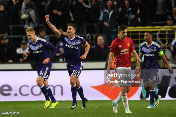 Leander Dendoncker of Anderlecht celebrates scoring his side's first goal during the UEFA Europa League quarter final first leg match between RSC...