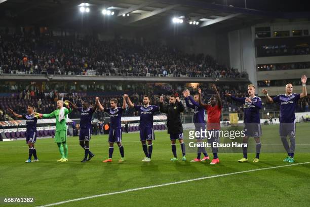 Anderlecht players applaud supporters after the 1-1 draw in the UEFA Europa League quarter final first leg match between RSC Anderlecht and...