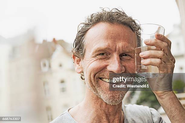 Rasing Lass 10,565 Raising Glass Of Water Stock Photos, High-Res Pictures, and ...