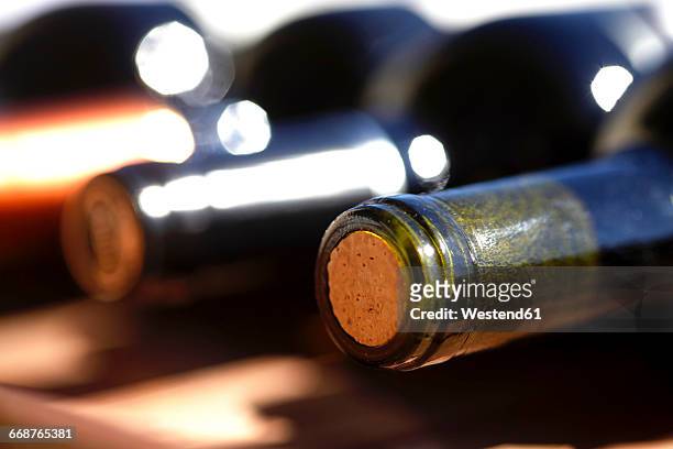 row of wine bottles - wine cork ストックフォトと画像