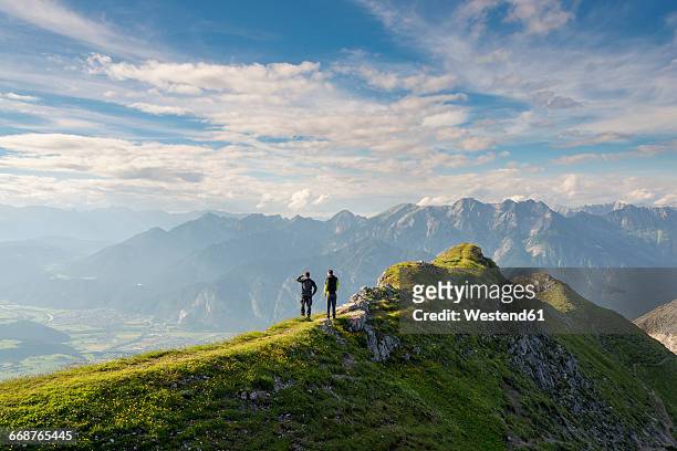 austria, tyrol, hiker looking to valley - observation point imagens e fotografias de stock