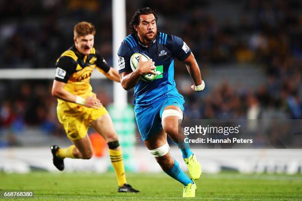 Steven Luatua of the Blues makes a break during the round eight Super Rugby match between the Blues and the Hurricanes at Eden Park on April 15, 2017...