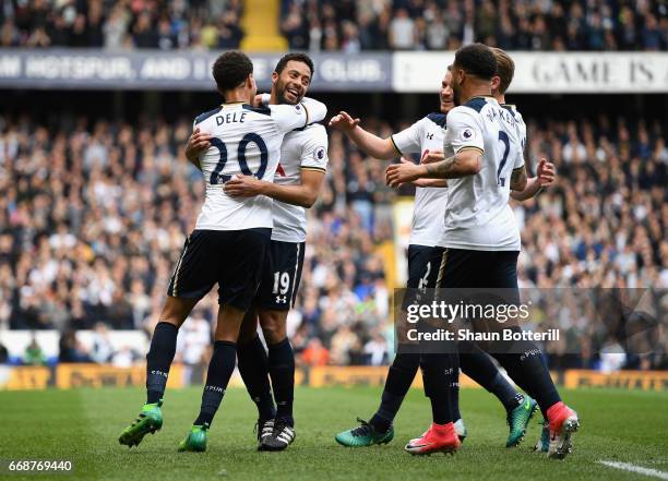 Mousa Dembele of Tottenham Hotspur celebrates scoring his sides first goal with his Tottenham Hotspur team mates during the Premier League match...