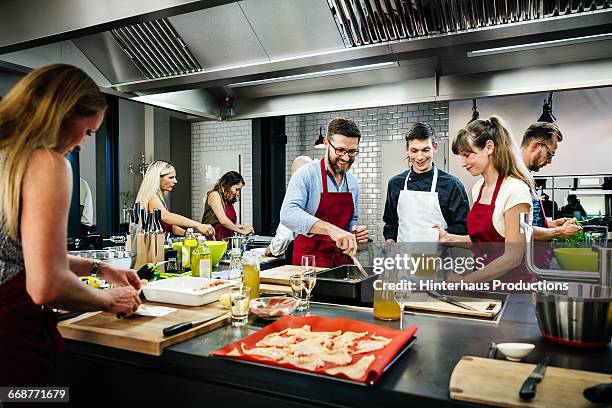 chef assisting a cooking class - 料理教室 ストックフォトと画像