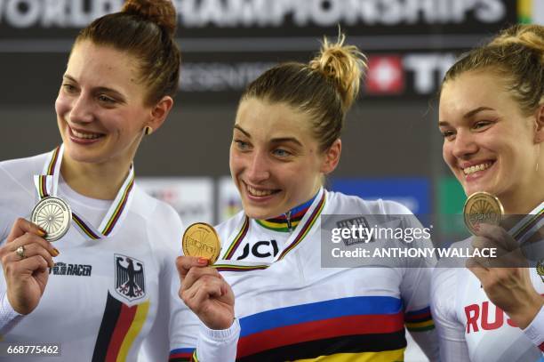 Gold medallist Daria Shmeleva of Russia poses with silver medallist Miriam Welte of Germany and bronze medallist Anastasiia Voinova of Russia on the...