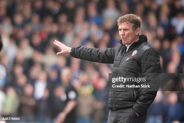 Phil Parkinson manager of Bolton Wanderers gives instructions during the Sky Bet League One match between Oldham Athletic and Bolton Wanderers at...