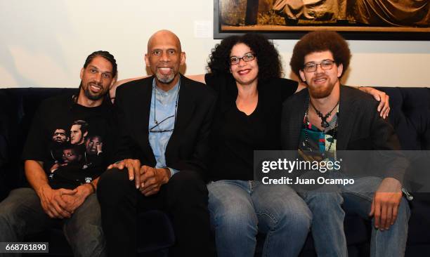 Former NBA player Kareem Abdul Jabbar and his kids Kareem Jr., Sultana and Adam pose for a photo during Kareem Abdul Jabbar's 70th birthday...