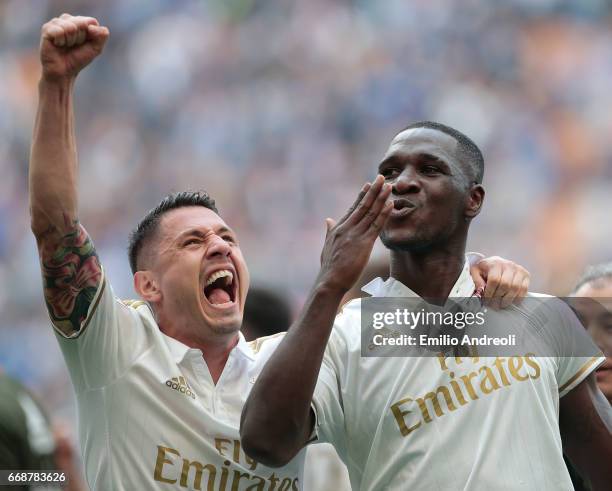 Cristian Zapata of AC Milan celebrates his goal with his team-mate Gianluca Lapadula during the Serie A match between FC Internazionale and AC Milan...