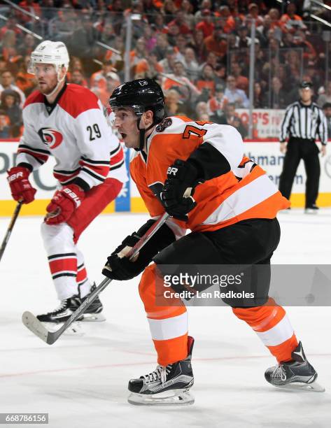 Mike Vecchione of the Philadelphia Flyers in action against Bryan Bickell of the Carolina Hurricanes on April 9, 2017 at the Wells Fargo Center in...