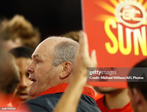 Rodney Eade, Senior Coach of the Suns addresses his players during the 2017 AFL round 04 match between the Carlton Blues and the Gold Coast Suns at...