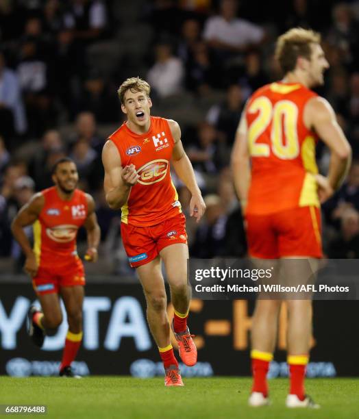 Tom Lynch of the Suns celebrates a goal during the 2017 AFL round 04 match between the Carlton Blues and the Gold Coast Suns at Etihad Stadium on...