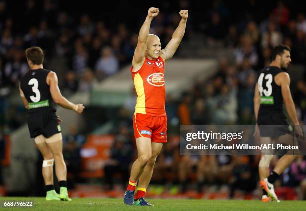 Gary Ablett of the Suns celebrates a goal during the 2017 AFL round 04 match between the Carlton Blues and the Gold Coast Suns at Etihad Stadium on...