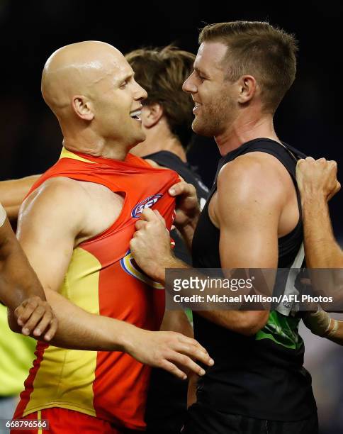 Gary Ablett of the Suns and Sam Docherty of the Blues wrestle during the 2017 AFL round 04 match between the Carlton Blues and the Gold Coast Suns at...