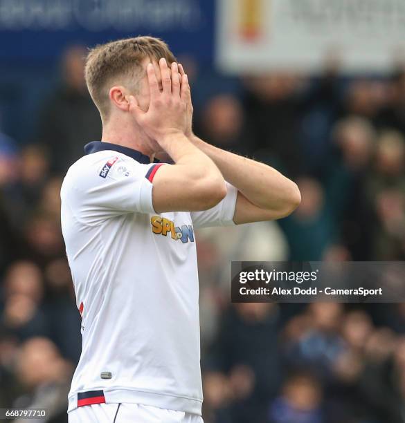 Bolton Wanderers' Chris Long reacts after the final whistle during the Sky Bet League One match between Oldham Athletic and Bolton Wanderers at...