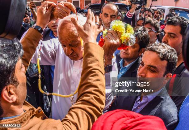 Former Chief Minister and National Conference patron Farooq Abdullah, addresses a press conference at his party headquarters after winning the...