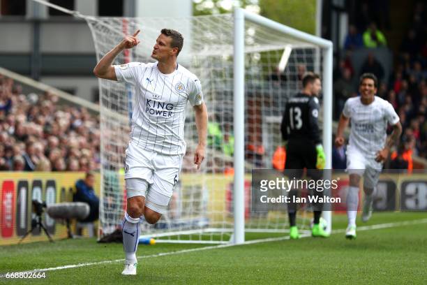 Robert Huth of Leicester City celebrates scoring his sides first goal during the Premier League match between Crystal Palace and Leicester City at...