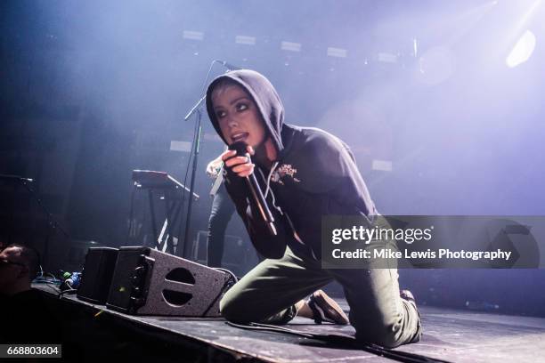 Jenna McDougall of Tonight alive performs on stage at Motorpoint Arena on April 14, 2017 in Cardiff, United Kingdom.