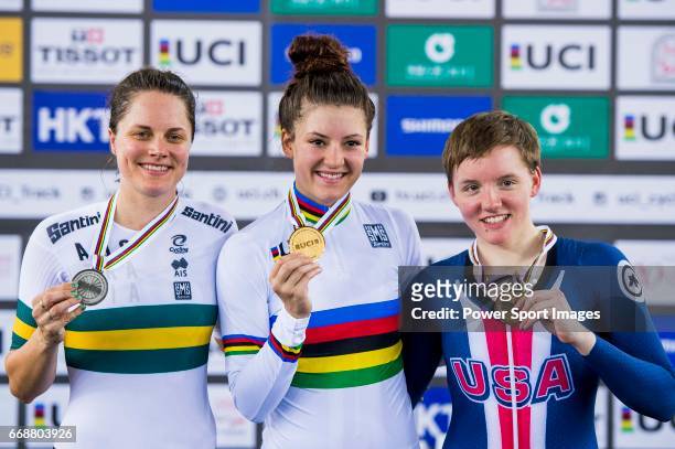 Chloe Dygert of USA celebrates winning in the Women's Individual Pursuit's prize ceremony with Ashlee Ankudinoff of Australia and Kelly Catlin of USA...