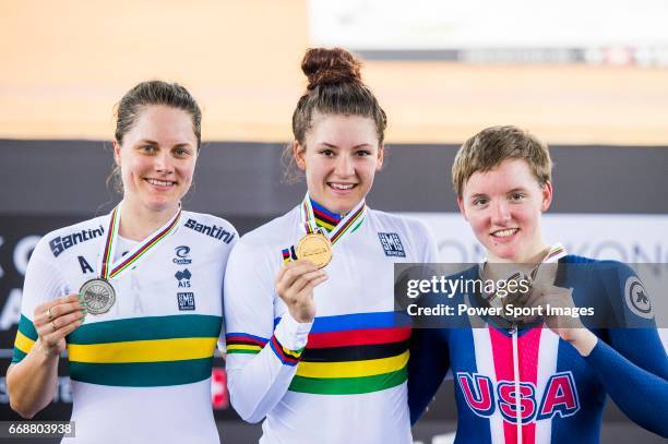 Chloe Dygert of USA celebrates winning in the Women's Individual Pursuit's prize ceremony with Ashlee Ankudinoff of Australia and Kelly Catlin of USA...