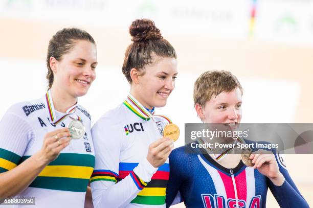 Chloe Dygert of USA celebrates winning in the Women's Individual Pursuit's prize ceremony with Ashlee Ankudinoff of Australia and Kelly Catlin of USA...