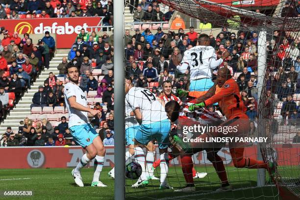 West Ham United's Irish goalkeeper Darren Randolph is unable to prevent Sunderland's French-born Tunisian midfielder Wahbi Khazri's goal during the...