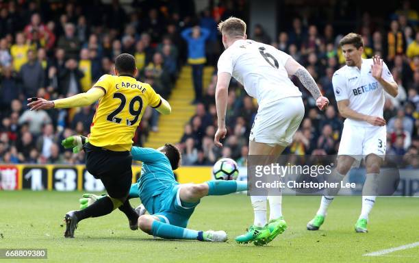 Etienne Capoue of Watford scores his sides first goal during the Premier League match between Watford and Swansea City at Vicarage Road on April 15,...