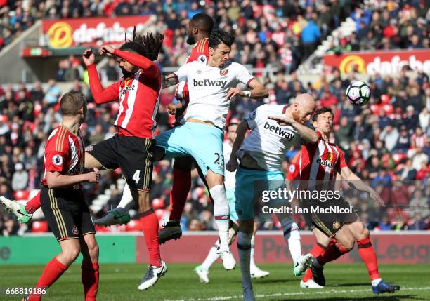 James Collins of West Ham United scores his sides second goal during the Premier League match between Sunderland and West Ham United at Stadium of...