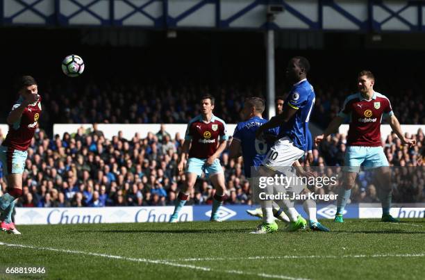 Phil Jagielka of Everton scores his sides first goal during the Premier League match between Everton and Burnley at Goodison Park on April 15, 2017...