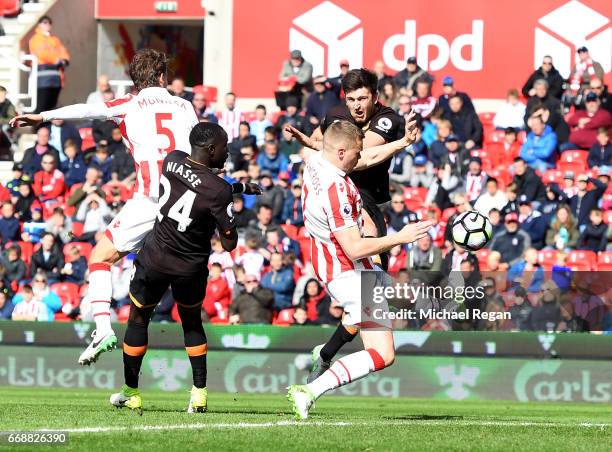 Harry Maguire of Hull City scores his sides first goal during the Premier League match between Stoke City and Hull City at Bet365 Stadium on April...