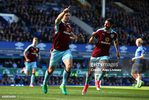 Sam Vokes of Burnley celebrates scoring his sides first goal with George Boyd of Burnley during the Premier League match between Everton and Burnley...