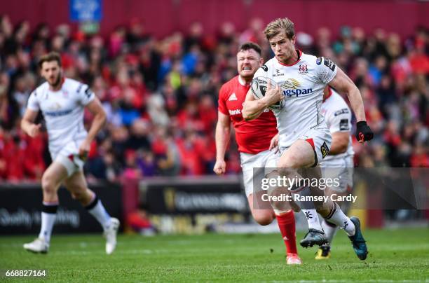 Limerick , Ireland - 15 April 2017; Andrew Trimble of Ulster makes a break during the Guinness PRO12 match between Munster and Ulster at Thomond Park...