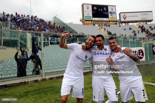 Omar El Kaddouri and Frederic Veseli and Rade Krunic of Empoli FC celebrates the victory after during the Serie A match between ACF Fiorentina and...