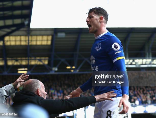 Ross Barkley of Everton celebrates as Ben Mee of Burnley scored a own goal for Everton's second during the Premier League match between Everton and...