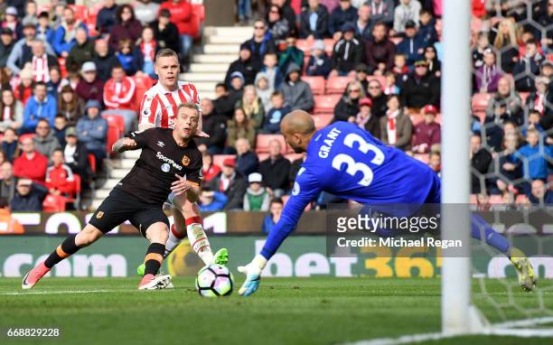 Lee Grant of Stoke City saves a shot during the Premier League match between Stoke City and Hull City at Bet365 Stadium on April 15, 2017 in Stoke on...
