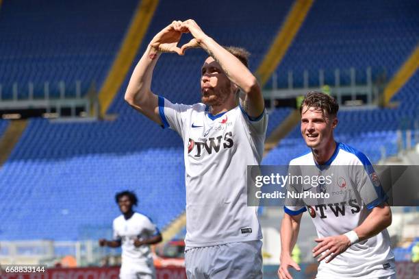 Andrea Conti of Atalanta celebrates scroing first goal during the italian Serie A match between Roma and Atalanta at the Olympic Stadium, Rome, Italy...