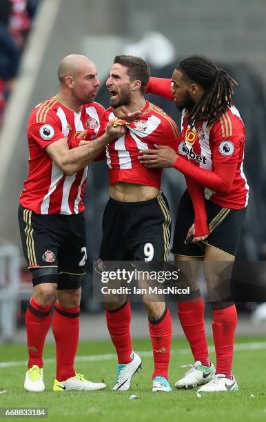 Fabio Borini of Sunderland celebrates scoring his sides second goal with Darron Gibson of Sunderland and Jason Denayer of Sunderland during the...